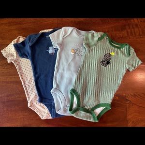 Four onesies, size 0-3 months